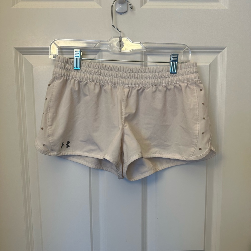 White Under Armour shorts with inside pocket, size small.